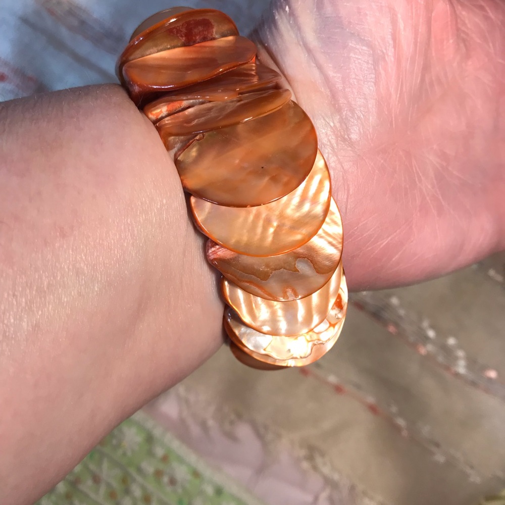 Two dyed abalone shell bracelets